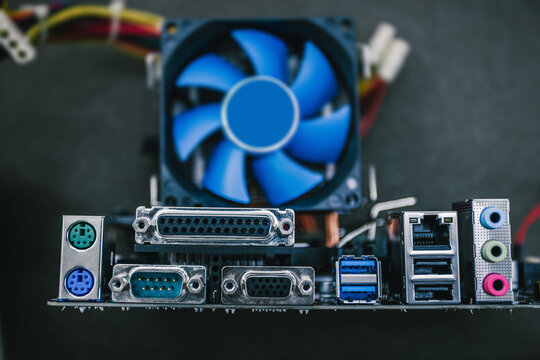 New computer box with various plugs. An IO panel of computer motherboard with USB 2.0, 3.0, 3.1, USB type C, Display port, PS2, Ethernet, SPDIF and 7.1 audio ports
