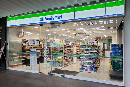 BANGSAR, MALAYSIA - 26 FEB 2022: Store front view of Familymart convenience store in Malaysia. FamilyMart is the 3rd largest Japanese convenience store franchise chain in Japan and operating in Asia.