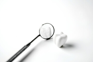Selected focus smile and whitening tooth reflect on mirror mouth on white background, healthy dental and smile confident                              