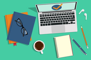 Laptop, books, notebooks and coffee on the desktop