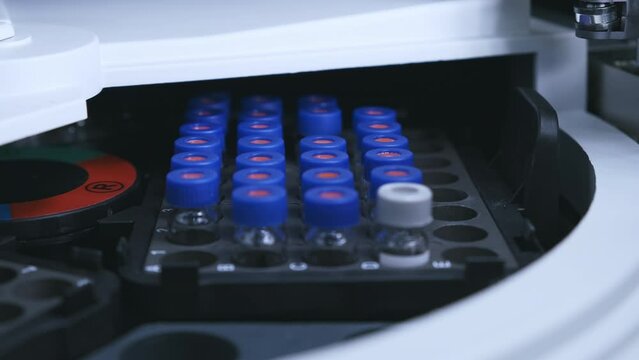 The chromatographic vials change a position in the auto sampler in HPLC system.