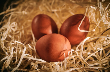 Chicken eggs, raw surface, rural still life, Easter