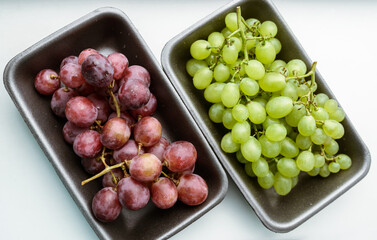 Grapes in a package. Selective focus.