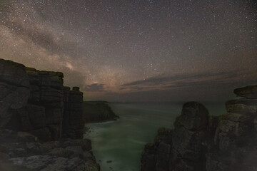 Night shots of the Milky Way rising over the cliffs in Cornwall, England