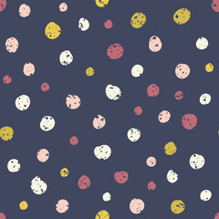 Cute polka dots seamless vector pattern background. Random paintedf textured pink,yellow, white dot shapes on blue background. Dense circle confetti texture. Graphic style design element repeat