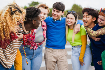 Young diverse people having fun outdoor laughing together 