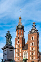 Fototapeta na wymiar Adam Mickiewicz Monument and Saint Mary Basilica