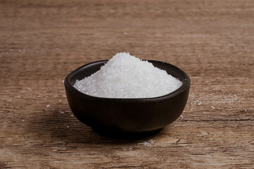 monosodium glutamate in a black cup