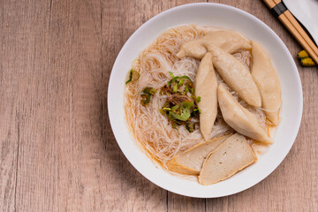Rice vermicelli noodle in Clear Broth soup with meatballs. Thai style cooking topview