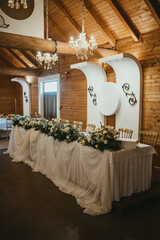 Decoration for special occasions. Beautiful table decoration with flowers. Rustic decoration. Wedding decoration.