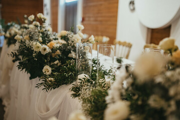 Decoration for special occasions. Beautiful table decoration with flowers. Rustic decoration. Wedding decoration.