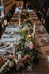 Decoration for special occasions. Beautiful table decoration with flowers. Rustic decoration. Wedding decoration.