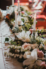 Decoration for special occasions. Beautiful table decoration with flowers. Rustic decoration. Wedding decoration.