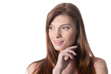 Fototapeta premium Close-up portrait of beautiful young woman with perfect skin on white background