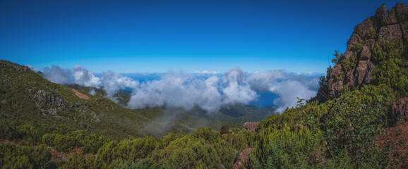 Fototapeta na wymiar Panoramic View from Pico Ruivo peak towards the refuge and Achada do Teixeira area on Madeira island of Portugal. October 2021