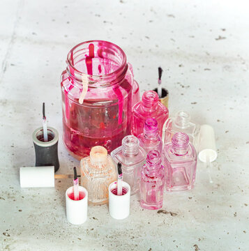 Empty nail polish bottles ready for recycling and nature protection