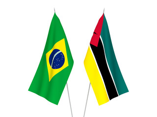 National fabric flags of Brazil and Republic of Mozambique isolated on white background. 3d rendering illustration.