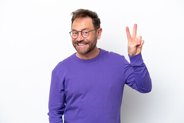 Fototapeta premium Middle age caucasian man isolated on white background smiling and showing victory sign