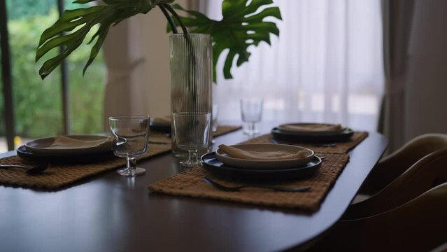 decorative ideas interior Table with glasses of house showflat arrangement indining room with background of white curtain with sunset home sweet home ideas concet