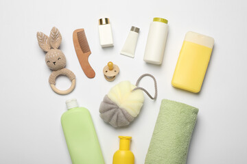 Flat lay composition with baby cosmetic products on white background