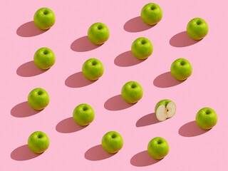 pattern with green apples against pink background