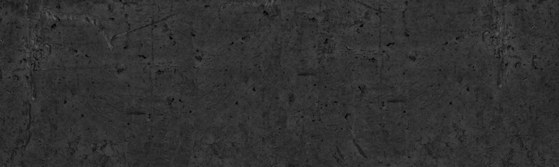 Old shabby black concrete wall wide panoramic texture. Rough textured cement slab surface. Abstract dark grunge large long background