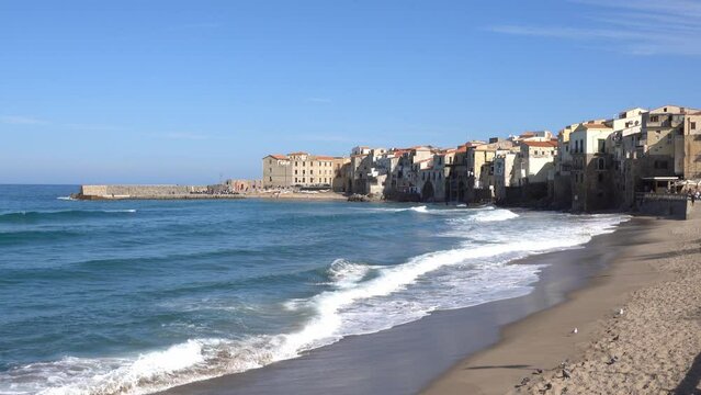 Sand beach with nobody in Cefalu, Sicily, Italy