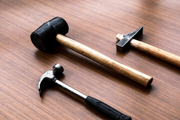  Some tools, a set of hammers with some nails and screws
