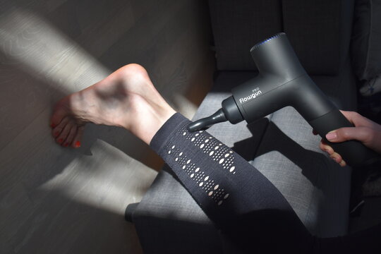 Product pictures of massage gun / pistol tool in use indoor and outdoor