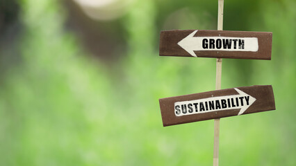 Growth - Sustainability on a wooden signpost on a natural green background.copy space.