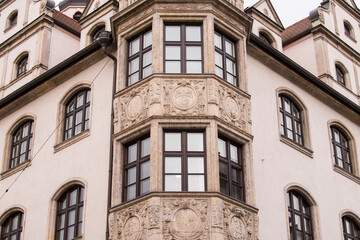 Munich, Germany - December 19 2021: Street view of the facade of the building in Munich downtown on Winter day.