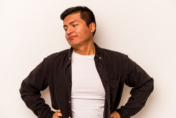 Young hispanic man isolated on white background dreaming of achieving goals and purposes