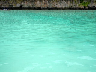 Emerald green clear color of Andaman sea Thailand for background wallpaper
