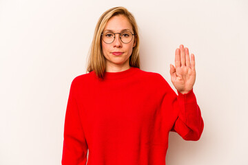 Young caucasian woman isolated on white background smiling cheerful showing number five with fingers.