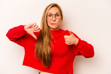 Young caucasian woman isolated on white background showing thumbs up and thumbs down, difficult...