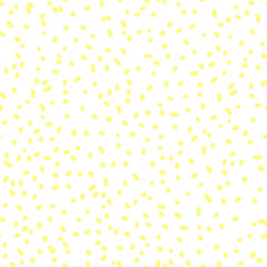 Seamless abstract pattern with small pale yellow dots on a white background