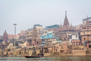 Varanasi city with ancient architecture. View of the holy Manikarnika ghat at Varanasi India at...