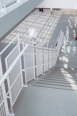Fototapeta premium interior of a modern building white ladder, stairs