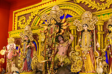 Fototapeta na wymiar Goddess Durga idol at Durga Puja pandal in Kolkata, West Bengal, India. Durga Puja is one of the biggest religious festival of Hinduism