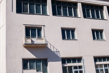 architecture facade of a white building with windows