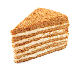 Slice of delicious layered honey cake isolated on white