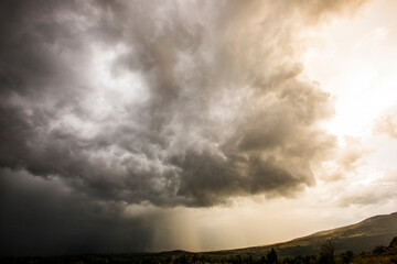 Fototapeta na wymiar Sunset and dramatic clouds in Cerdanya, Pyrenees, Spain