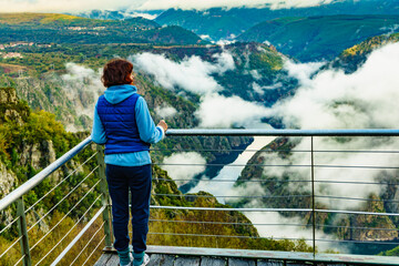 Tourist woman enjoy mountain view. River Sil Canyon, Spain