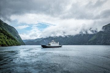 ferryboat sailing on fjord in Norway Scandinavia