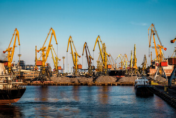 Naklejka premium industrial cargo port with cranes