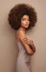 Poster Beauty portrait of African American girl with afro hair. Beautiful black woman. Cosmetics, makeup and fashion © Oleg Gekman