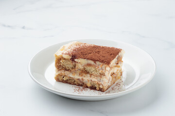 Piece of Homemade Tiramisu cake dessert