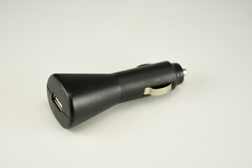 Black USB electronics device car charger isolated