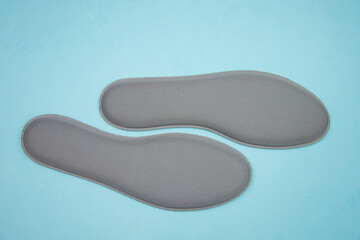  gray Memory Foam  Shoe Insoles on blue  background