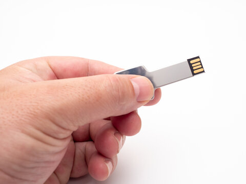 Silver Usb Flash Drive In The Form Of A Key On A White Background